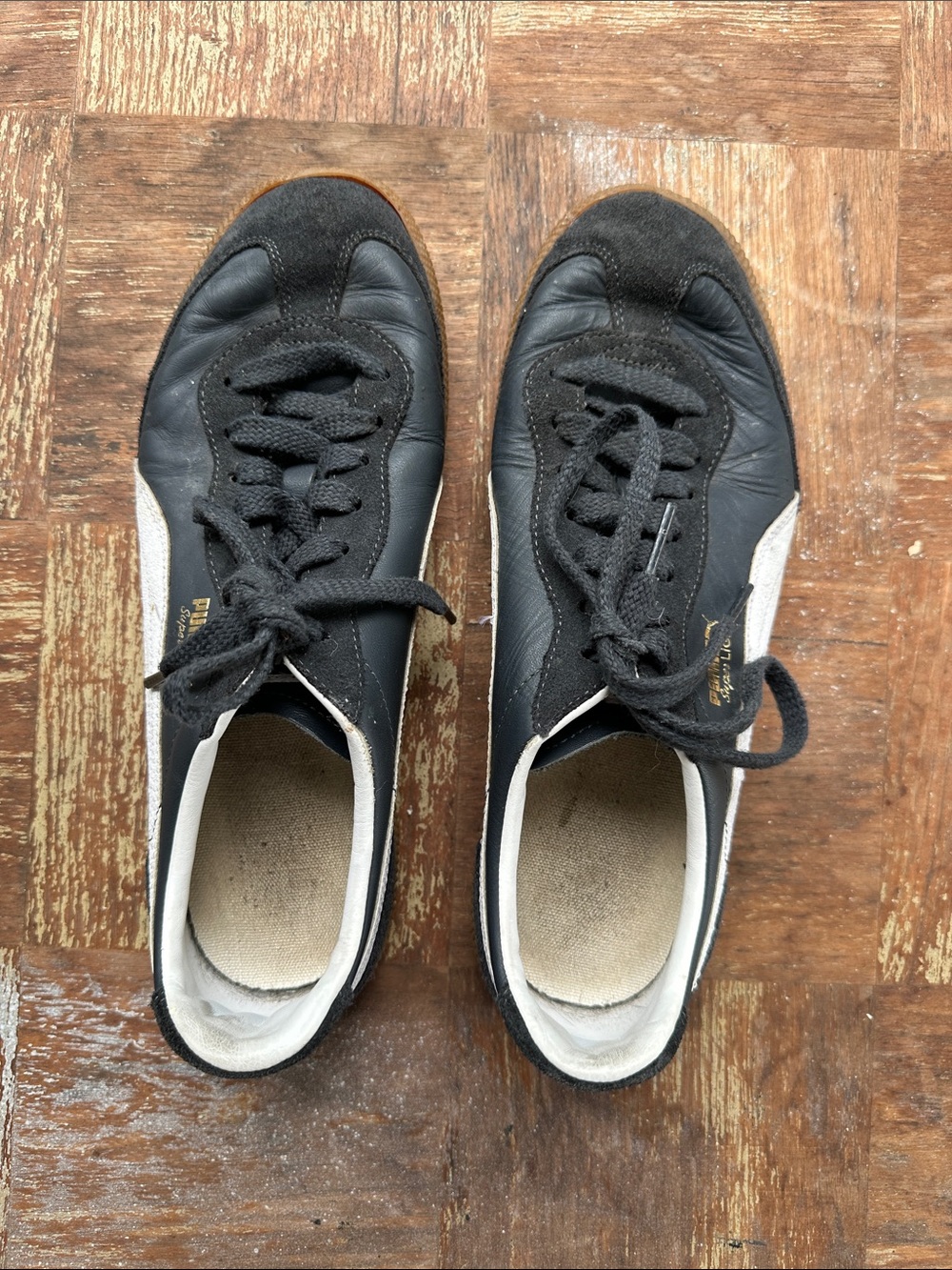 Puma Superliga Black Sneakers with White Side Stripe